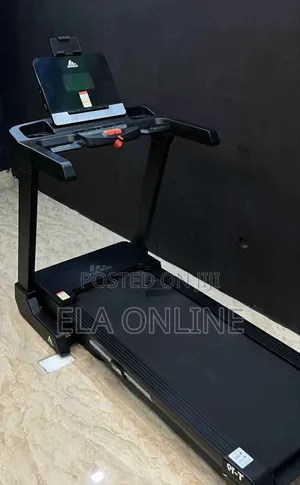 Photo - New Home Gym Reebok and Adidas Treadmills