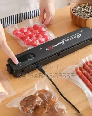 Photo -  Automatic Vacuum Sealer Machine የላስቲክ ማሸጊያ