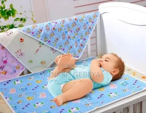 Photo - Water Proof Baby Urine Mat Cover(የህፃናት ምንጣፍ)