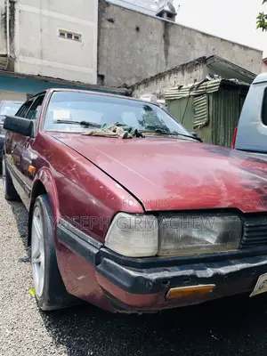 Photo - Mazda 626 1987 Burgundy