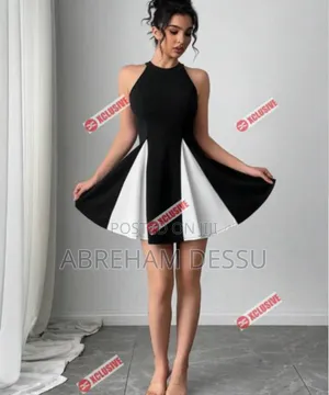 Photo - Pleated Hem Contrast Panel Sleeveless Mini Dress