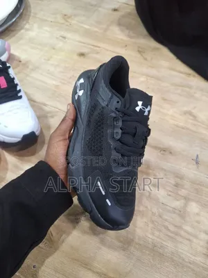 Under Armour Ladies Sport Sneakers 
 Made in Vietnam