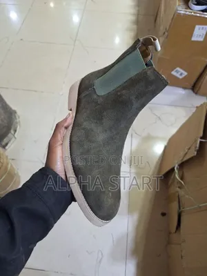 Photo -  Velvet Boots Shoes
 Stock Product