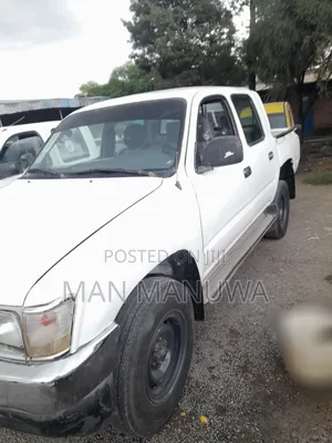 Photo - Toyota Hilux 2000 White