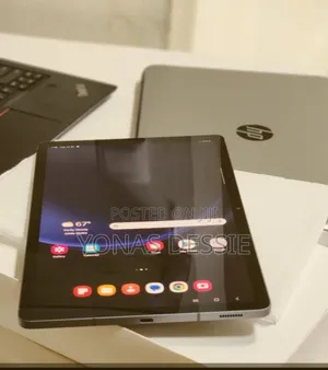 Photo - New Samsung Galaxy Tab S9 FE 128 GB Silver