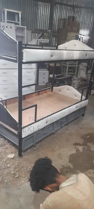 Photo - ሁሉንም ያሟላ ተደራራቢ አልጋ