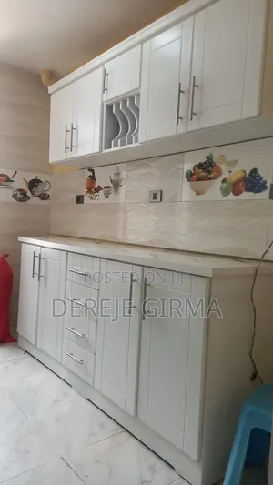 Photo - በmdf የተሰራ 2ሜትር ኪችን ከነተሰቃዩ