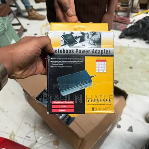 Photo - Universal Notebook Power Adapter With 6 Different Pins