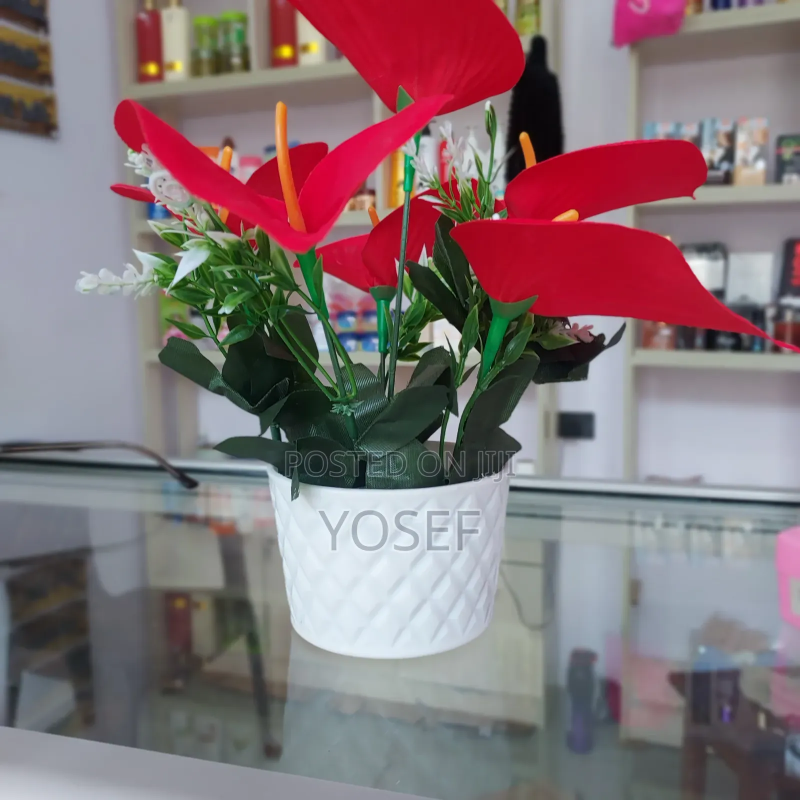 Vibrant Red Artificial Flower In Elegant White Pot