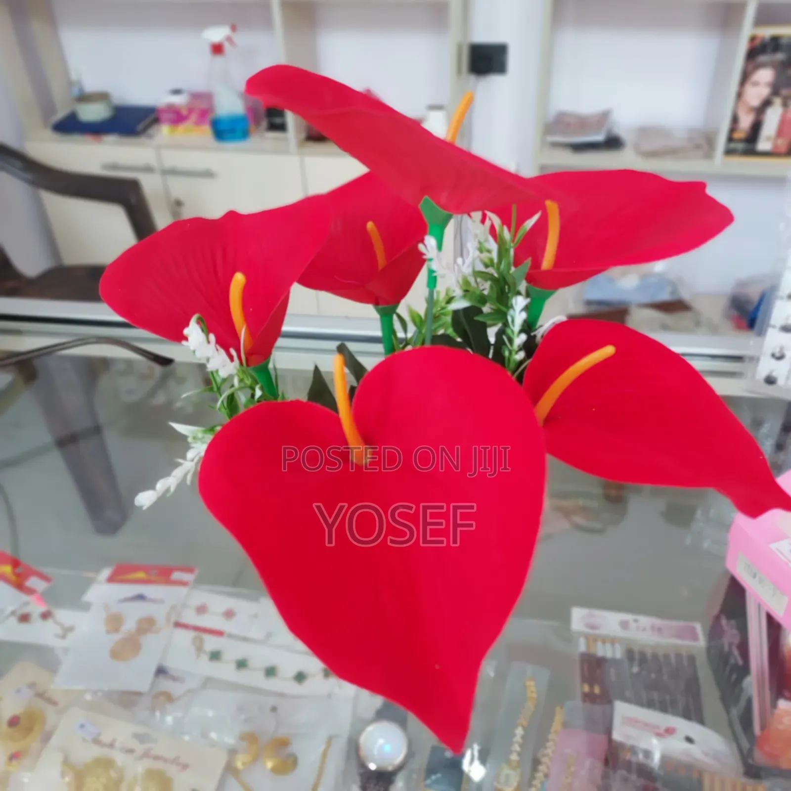 Vibrant Red Artificial Flower In Elegant White Pot