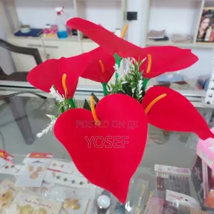 Vibrant Red Artificial Flower In Elegant White Pot