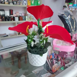 Vibrant Red Artificial Flower In Elegant White Pot