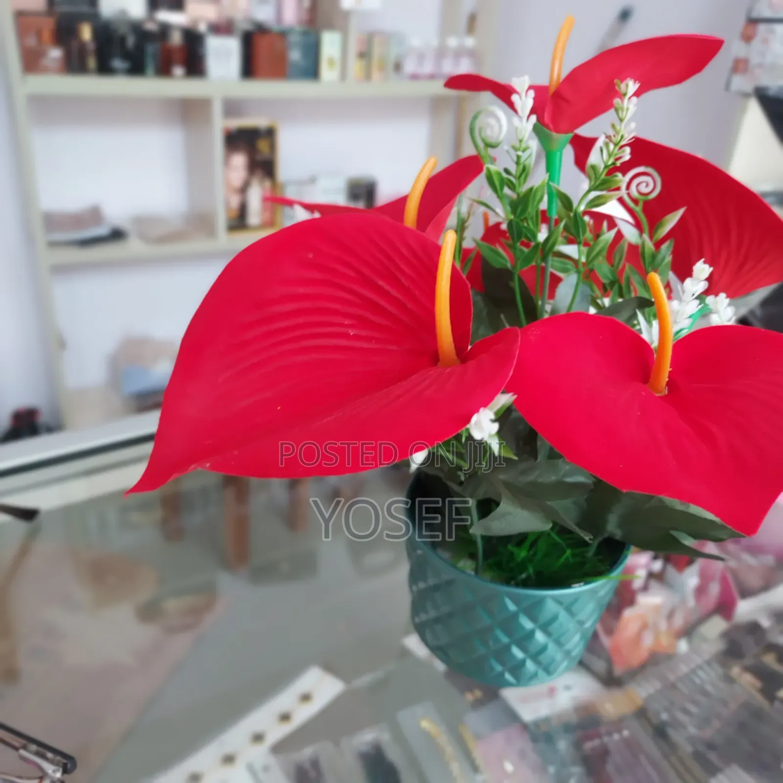 Vibrant Red Artificial Flower In Elegant White Pot