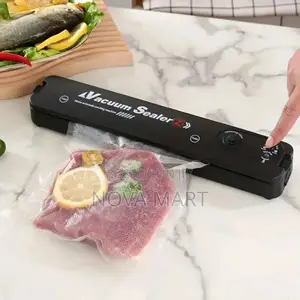 Photo - Automatic Vacuum Sealer Machine የላስቲክ ማሸጊያ