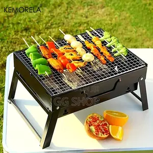 Photo - Portable Charcoal BBQ Grill