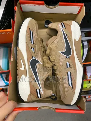 Photo - Nike Men's Jam in Different Color on Hand