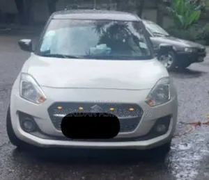Photo - Suzuki Swift 2021 White