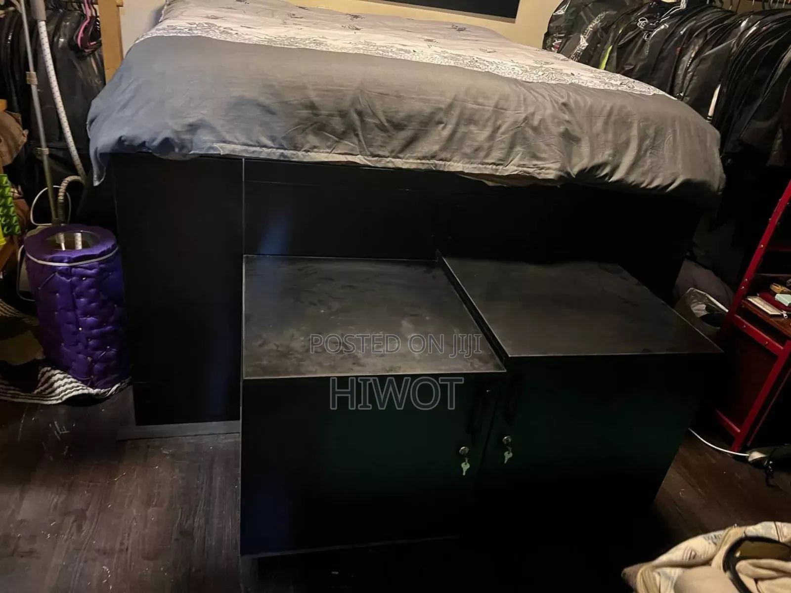 2 Black Bed Side Tables With Wheels Both With King Size Bed