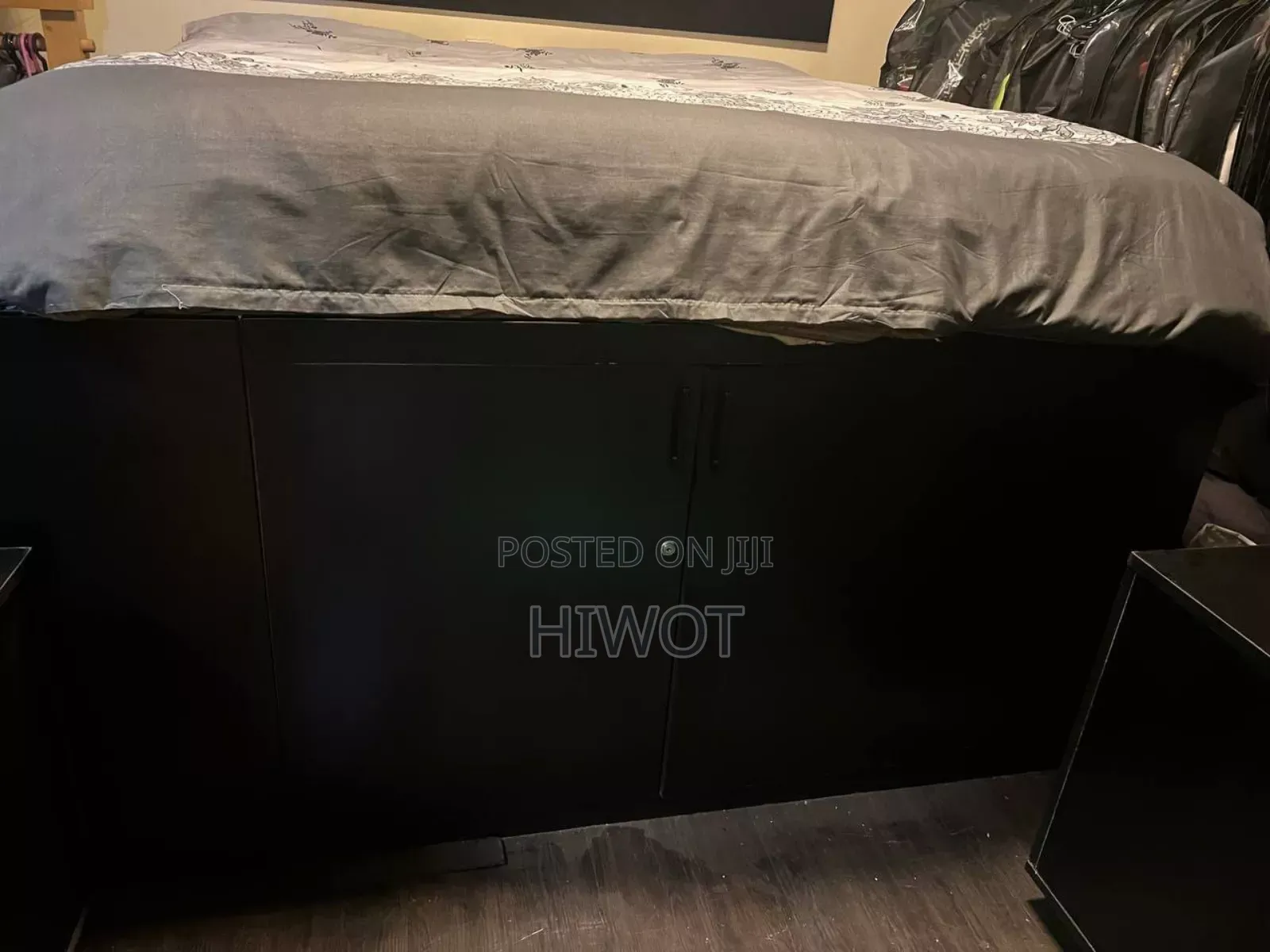 2 Black Bed Side Tables With Wheels Both With King Size Bed