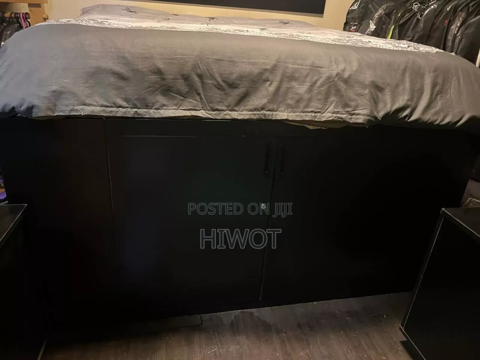 2 Black Bed Side Tables With Wheels Both With King Size Bed