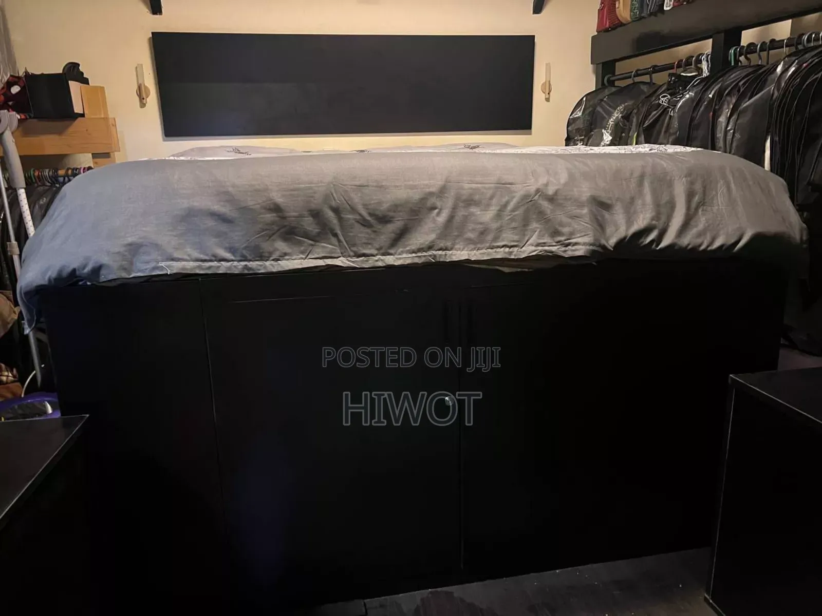 2 Black Bed Side Tables With Wheels Both With King Size Bed