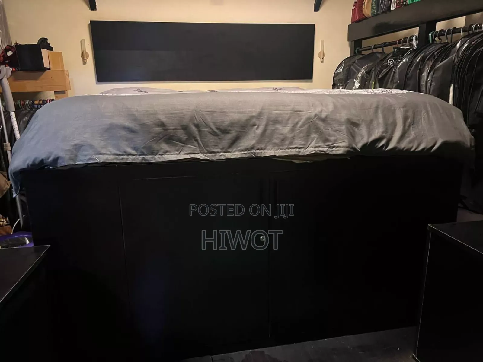2 Black Bed Side Tables With Wheels Both With King Size Bed