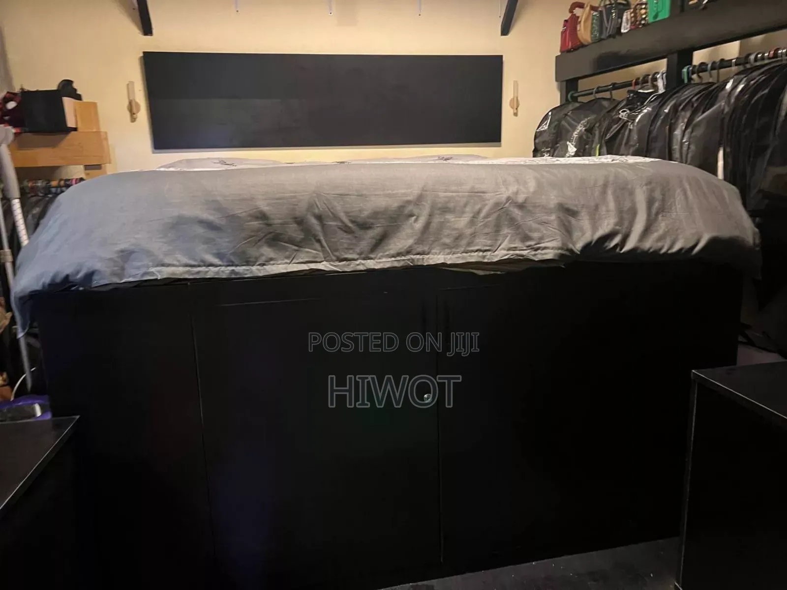 2 Black Bed Side Tables With Wheels Both With King Size Bed