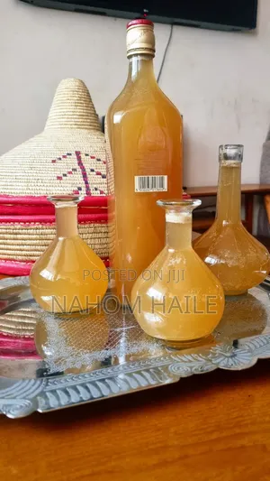 Photo - ሮዝ እፁብ የማር ጠጅ እና አገልግል