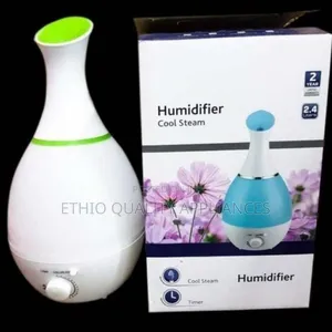 Photo - Humidifier በኤሌክትሪክ የሚሰራ