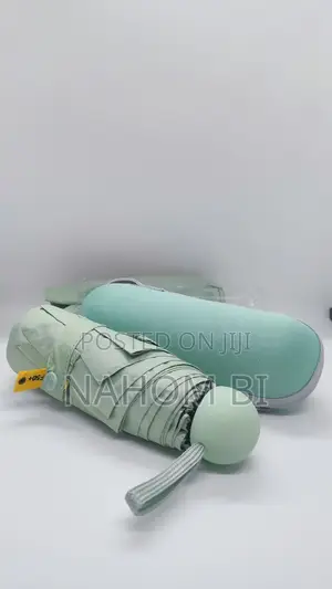 Photo - Mini Pocket Uv Umbrella Upf 50+