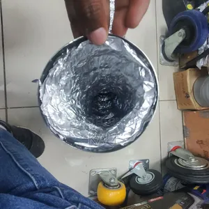 Photo - This Material Is an Insulated Flexible Aluminum Duct.