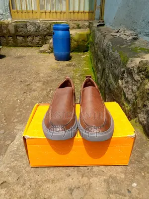 Stylish Brown Leather Slip-on Shoes – Brand New!