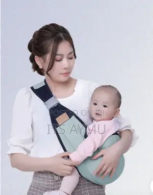 Photo - Baby Sling Carrier በቀላሉ በቦርሳችን ይዘነው ስንፈልግ የምንጠቀምበት