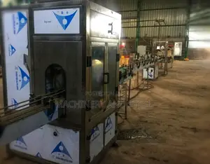 Complete Injection Blow Molding, Filling, And Packing Line