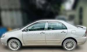 Photo - Toyota Corolla 2003 Gold