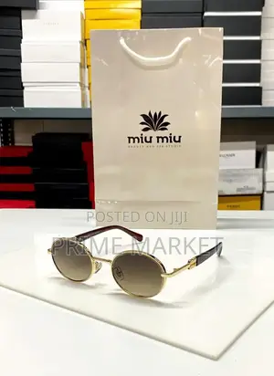 Photo - Miu Miu Oval Sunglass