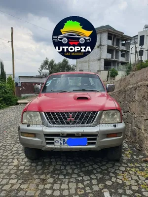Photo - Mitsubishi L200 2001 Beige