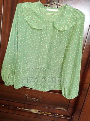 Photo - Used Like New Shirt. Size S,M