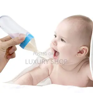 Baby Bottle Food Feeder የህፃናት መመገቢያ ጡጦ