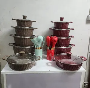 Photo - Cookware Package ድስቶች መጥበሻ ከነክዳኑ ሲልከን ማማሰያ እና ጭልፋዎች