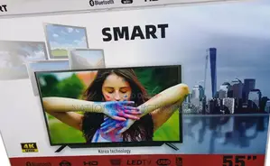 Photo - Smart 55 Inch Tv Smart Uhd Androd Tv
