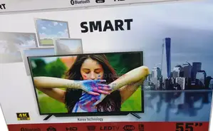 Photo - Smart 55 Inch Tv Smart Uhd Androd Tv