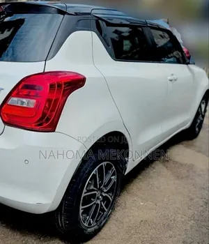 Photo - Suzuki Swift 2022 White