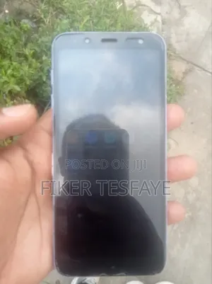 Photo - Samsung Galaxy J6 Plus 32 GB Gray