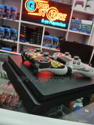 Photo - Playstation 4 Slim Model Playing Game