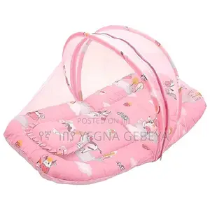 Photo - 3-in-1 Baby Bed + Pillow + Mosquito Net