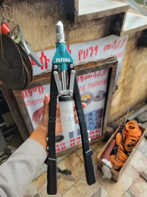 Photo - Total Hade Rivete Gun