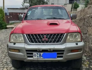 Photo - Mitsubishi L200 2001 Burgundy