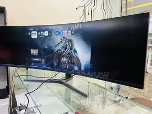 Photo - Samsung 49’’ Curved Monitor
