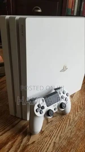 Photo - Ps4 Pro ከcan Playstation